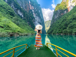 The Nho Que River offers unforgettable views with dramatic mountain landscapes, peaceful boat rides, and pristine natural beauty.