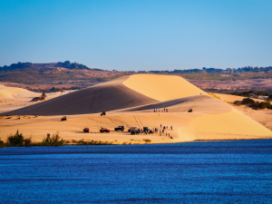 Discover the beauty of Mui Ne with its breathtaking beaches, unique sand dunes, vibrant fishing village, and year-round sunshine, perfect for an unforgettable getaway.
