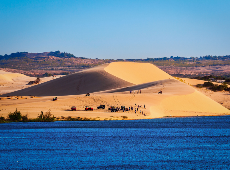 Discover the beauty of Mui Ne with its breathtaking beaches, unique sand dunes, vibrant fishing village, and year-round sunshine, perfect for an unforgettable getaway.